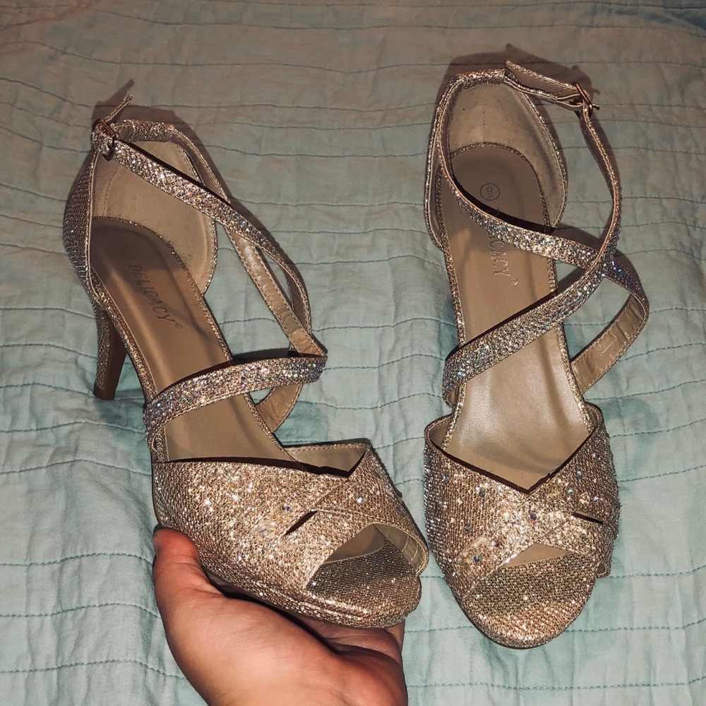 Gold sparkly heels.